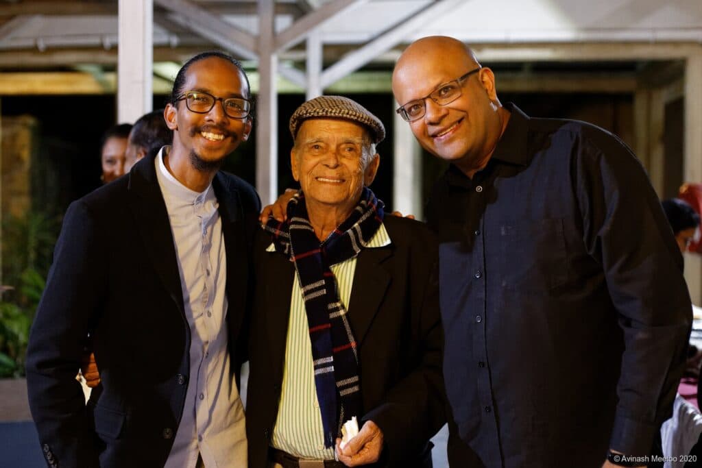 Serge Lebrasse standing in the centre of a group photograph in 2020